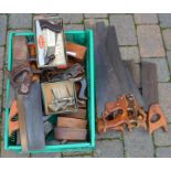 Quantity of vintage hand saws and other various tools