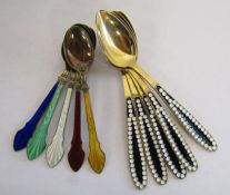 5 Soviet silver gilded spoons with black and white enamelling and 5 Denmark sterling silver spoons