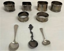 6 silver napkin rings and 3 silver spoons, 5.58ozt