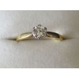 18ct gold solitaire diamond ring, approximately 0.60ct, 2.8g, size M / N