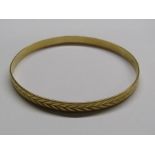 18ct gold (tested as) patterned bangle - total weight 15.7g