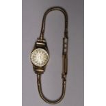 Ladies Accurist wristwatch with 9ct gold articulated strap and cut glass crystal (missing winder)