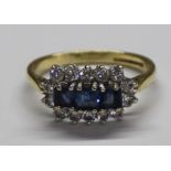 18ct gold 3 stone square cut sapphire ring surrounded by 14 diamonds size N