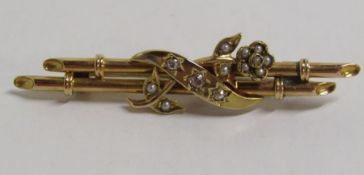 Tested as 14ct gold brooch with seed pearl and 3 diamond design - total weight 3.72g