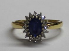 18ct gold sapphire and diamond cluster ring, size K / L, 4.2g