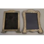 2 silver photograph frames both missing back stands & both Birmingham 1910. Largest 19cm by 15cm