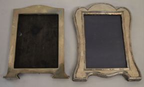 2 silver photograph frames both missing back stands & both Birmingham 1910. Largest 19cm by 15cm