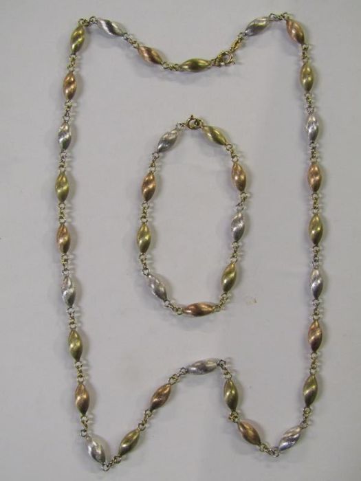9ct gold tri colour necklace and matching bracelet - total weight 27.1g (bracelet tested as 9ct)