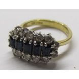 18ct gold ring with 5 baguette cut sapphires and 14 diamond surround - sapphire size approx 4mm -