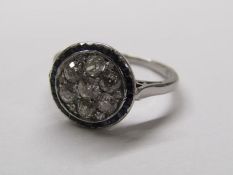 Early 20th century diamond circular plaque cluster ring surrounded by channel set sapphires,