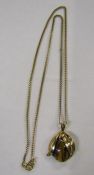 9ct gold (tested as) necklace and 9ct pendant (tested as) with tigers eye stone - total weight 7.4g