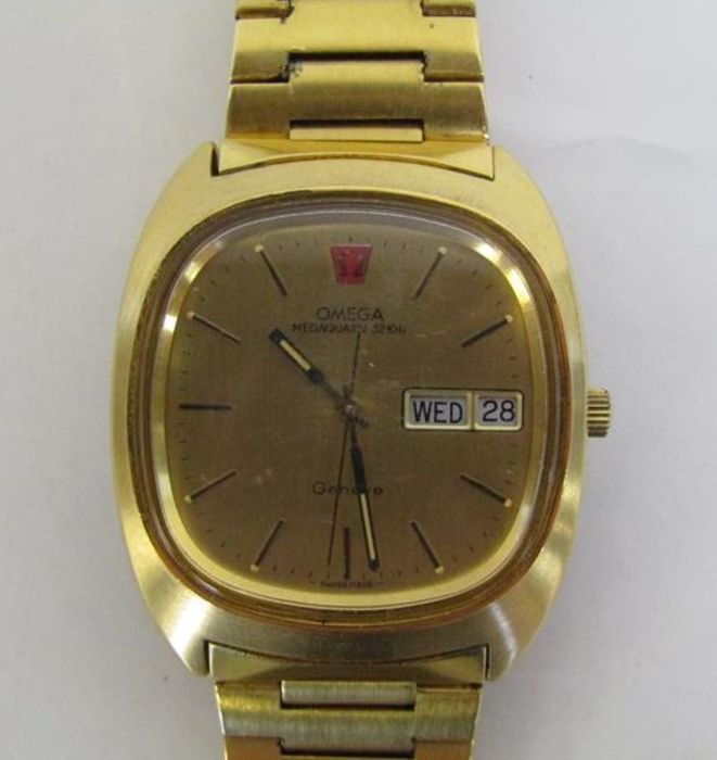 Gents Omega Geneve gold plated wristwatch, with day and date window, luminescent tipped hands within