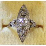 Art Deco diamond ring set in tested as 9k gold with central diamond approximately 0.40ct, flanked by