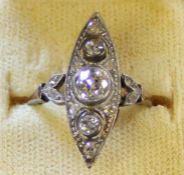 Art Deco diamond ring set in tested as 9k gold with central diamond approximately 0.40ct, flanked by