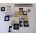 Silver coins: Silver Jubilee, One Dollar, Britannia, Queen Elizabeth I