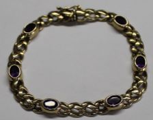 9ct gold bracelet of plaited design set with 6 oval amethysts, 12.6g