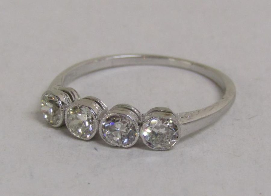 18ct (stamped 750) white gold, 4 stone round diamond ring - total 0.50ct - total weight 1.76g - ring