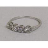 18ct (stamped 750) white gold, 4 stone round diamond ring - total 0.50ct - total weight 1.76g - ring
