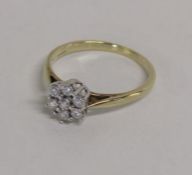 9ct gold 7 diamond daisy ring - approx. 0.25ct - total weight 1.97g - ring size N/O