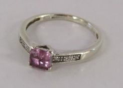 9ct white gold ring with diamond chips and pink topaz - ring size N/O - total weight 1.88g