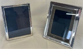 Two silver photo frames - Carrs of Sheffield 2001 17cm x 22cm and 1997 15.5cm x 20.5cm