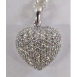 Tested as 18ct white gold hollow heart pendant set with 55 brilliant cut diamonds each stone approx.