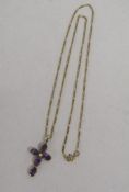 9ct gold chain with 9ct gold mounted amethyst and pearl cross pendant - total weight 3.59g