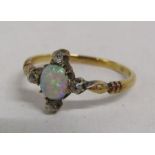 18ct gold ring with opal and diamonds - ring size O - total weight 2.1g