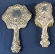 Edwardian silver mounted hair brush and hand mirror, Birmingham 1927 with embossed Art Nouveau style