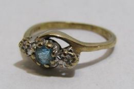 Tested as 9ct gold blue topaz with 2 illusion set diamonds twisted shoulder ring - ring size M -