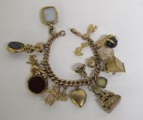 9ct gold curb chain charm bracelet with 3 plated Victorian fob seals & blood stone & carnelian