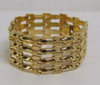 Lebanese gold gate type bracelet marked 750 and testing as 18ct, 31.1g