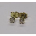 Pair of diamond stud earrings marked 585 (14ct gold)