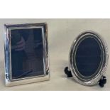 2 silver photo frames by Carrs of Sheffield 2002 - rectangular 13.5cm x 18.5cm and oval with rope