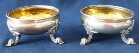 Pair of Victorian silver salts on three scroll feet with gilt interior, R & S Garrard & Co, London