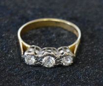 Diamond trilogy ring tested as 18ct gold total diamonds size 0.42ct ring size N weight 3.58g