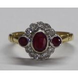 18ct gold ruby and diamond ring, total weight 3.0g - ring size M - central ruby approx. 5mm x 4mm