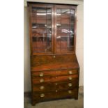 Georgian mahogany bureau bookcase with inlaid interior on bracket feet (back foot requires