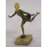 Art Deco ice skating figure on an onyx base with ivorine head approx. 22cm tall