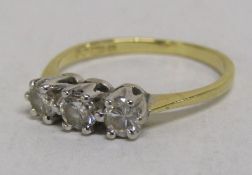 18ct 3 stone diamond ring - total 0.50ct - total weight 2.23g - ring size K