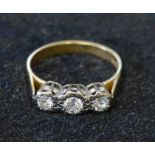Diamond trilogy ring tested as 18ct gold total diamonds size 0.42ct ring size N weight 3.58g
