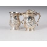 An embossed jug with scroll handle, 11.9oz troy approx, and a similar jug, 14.2oz troy approx