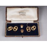 A pair of 9ct gold Marine link cufflinks, 4.3g, and a pair of dress studs