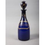 An early 19th century Bristol blue glass and enamelled Holland's decanter and stopper, 9 1/2" high