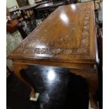 A carved sheesham brass and copper inlaid coffee table, on cabriole supports, 48" wide x 22" deep