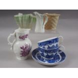 Eight pieces of Royal Worcester china, including an 18th century style cream jug with floral
