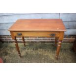 An Edwardian mahogany side table, fitted one drawer, on turned supports, 36" wide x 18" deep x 29