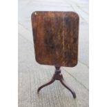 A 19th century mahogany provincial rectangular tilt top occasional table, on turned column and