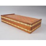 A polished as walnut and inlaid backgammon board with composition pieces, 19" wide, a plated tray, a