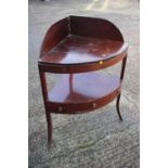 A mahogany bowfront corner washstand, fitted one drawer, on splay supports, 28" wide x 20" deep x 38